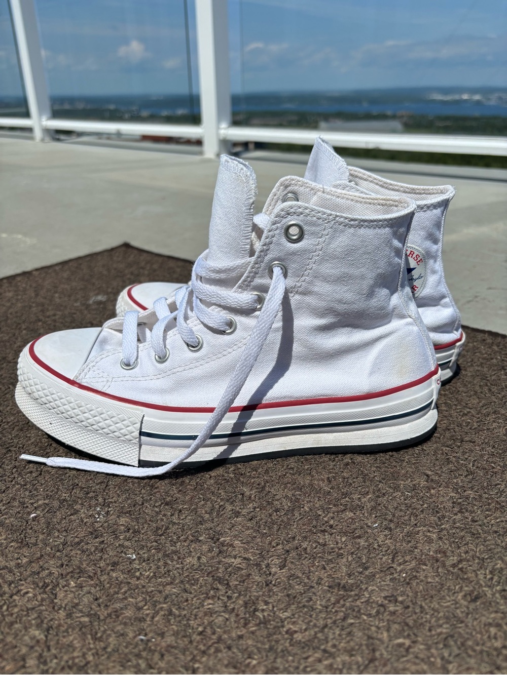 Converse White Canvas High-Tops with Red Stripe